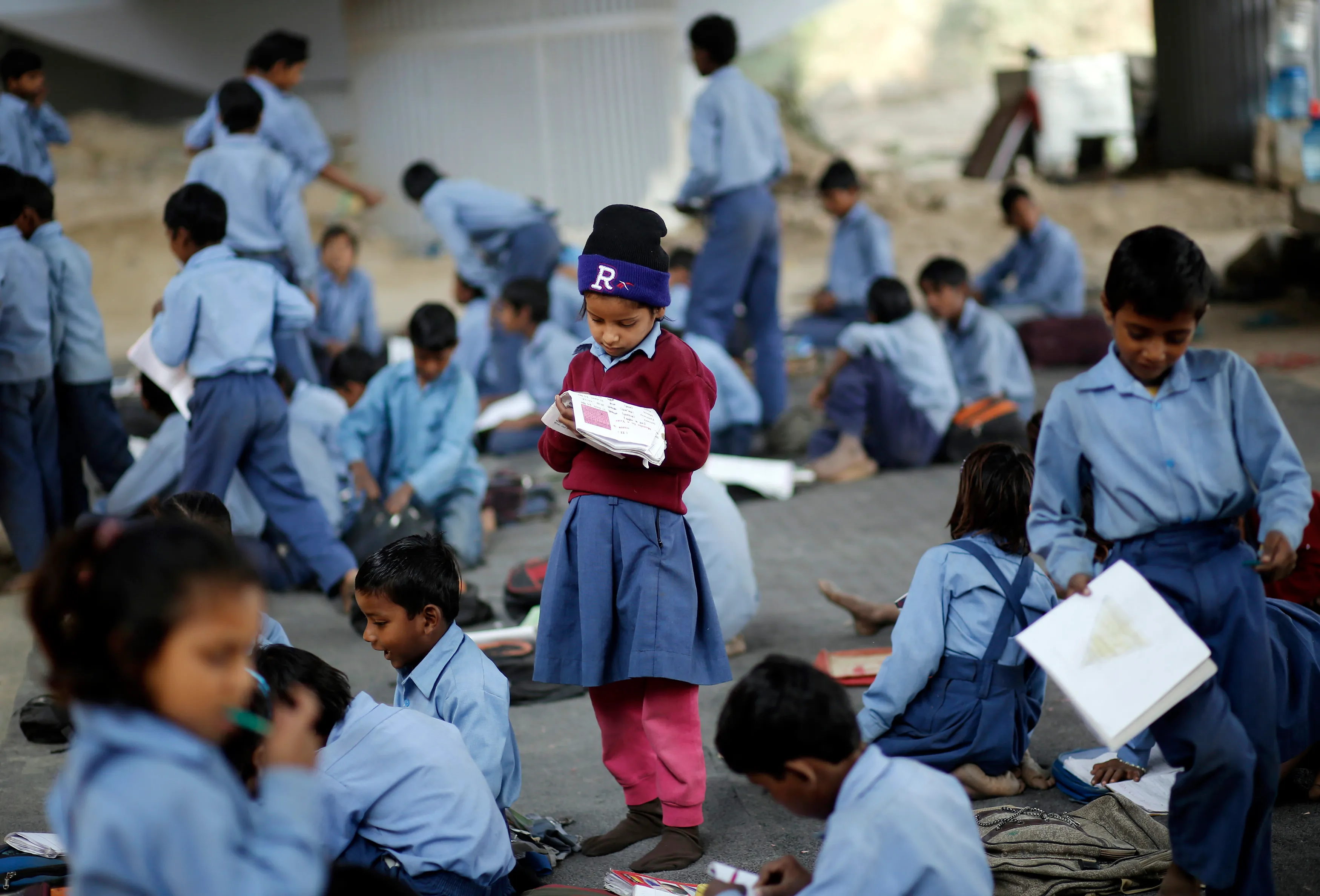 Children learning in a community classroom supported by ACU Education Foundation